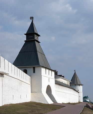 Towers and wall of the Kazan Kremlin on sunny day, Kazan city, historical architecture republic of Tatarstan, UNESCO site.
