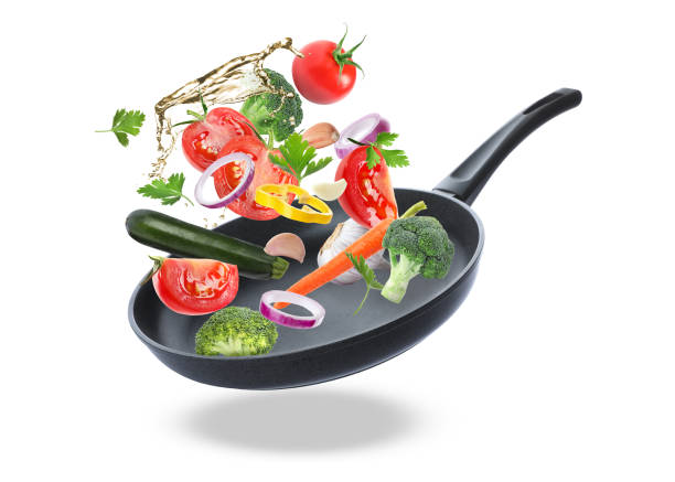 istock Tasty fresh ingredients and frying pan on white background 1477274728