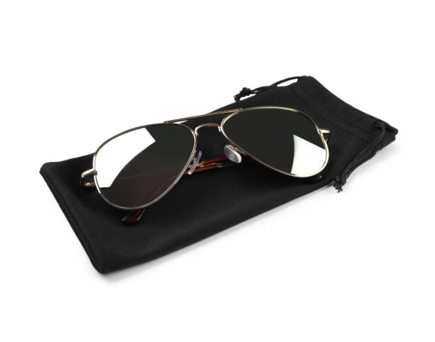 istock Modern sunglasses with black cloth bag on white background 1477279707