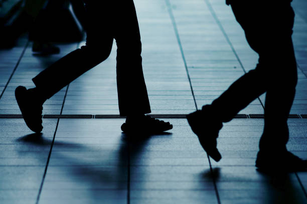 istock Walking person silhouette and ground 1477289554