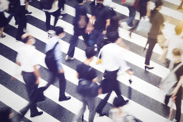 istock People crossing the pedestrian crossing Business image 1477290168