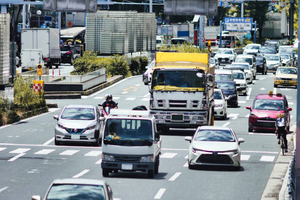istock Road and car traffic image 1477294026