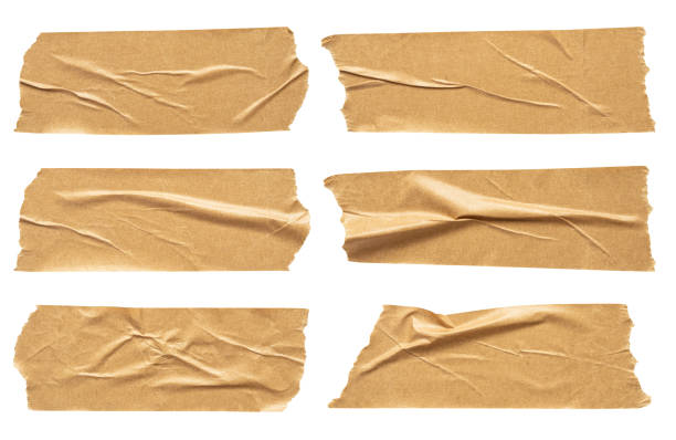 istock Brown adhesive paper tape set isolated on white background 1477294132