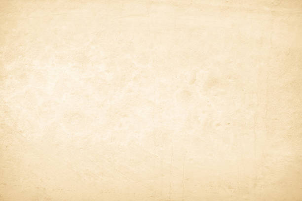 istock Old concrete wall texture background. Close up retro plain beige color cement material surface rough for show or advertise promote product content on display and brown paper design element concept. 1477294616