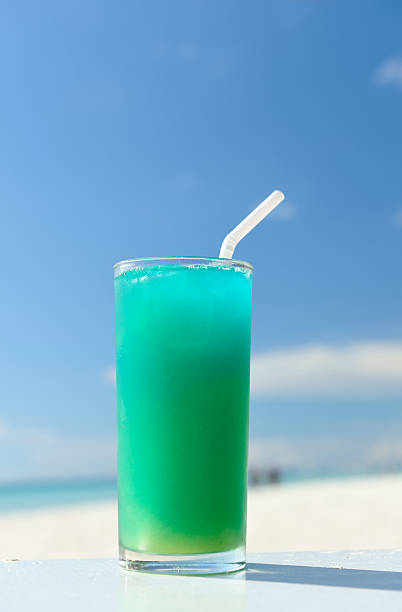 Beach cocktail Cocktail at the beach,  shallow depth of field blue hawaiian stock pictures, royalty-free photos & images