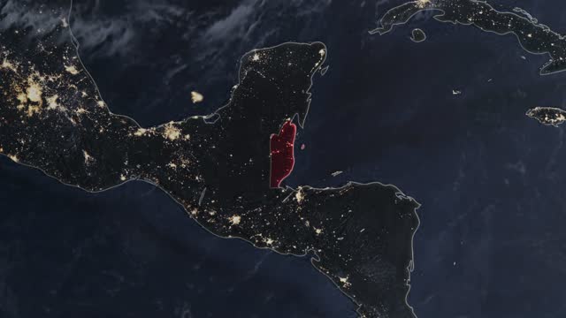 Highlighted dark map of Belize, zooming in from the space through a 4K photo real animated globe, with a panoramic view consisting of Africa, North and South America. Epic spinning world animation, Realistic planet earth, highlight, satellite, aerial