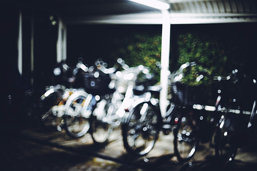 bicycle parking lot blur at night