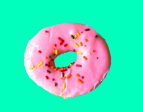 Glazed Pink Doughnut with Sprinkles, Green Background