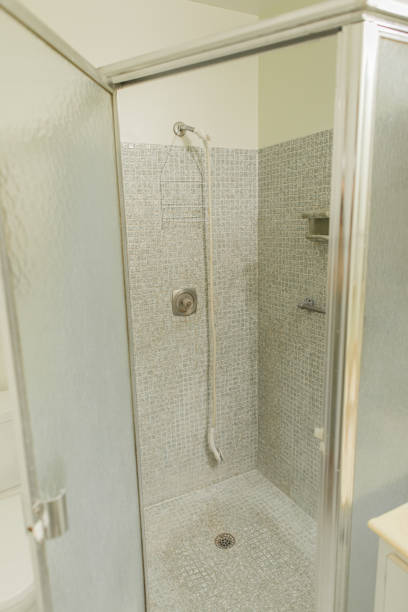 istock Outdated Basic White & Blue Bathroom in a South Florida Home in 2023 1477314305