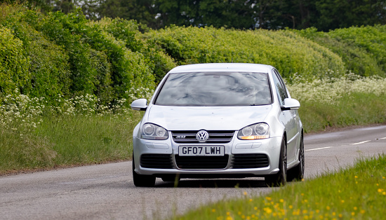 Aylesbury,Bucks,UK - May 15th 2022. 2007 VOLKSWAGEN Golf R32 car travelling on an English country road