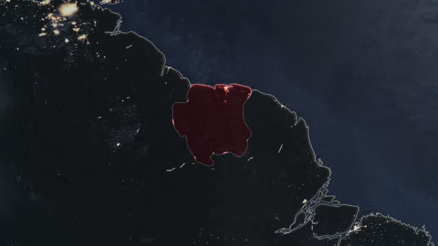 Highlighted dark map of Suriname, zooming in from the space through a 4K photo real animated globe, with a panoramic view consisting of Africa, North and South America. Epic spinning world animation, Realistic planet earth, highlight, satellite, aerial
