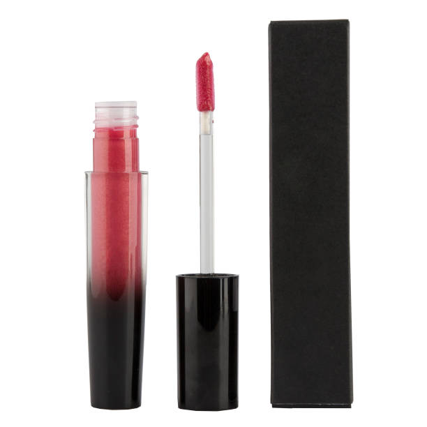 istock Plastic open lip gloss in a transparent package with a brush on an isolated white background 1477320855