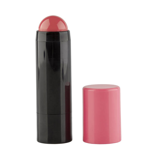 istock Cream blush in a black case on a stick on a white isolated background 1477320964