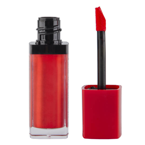 istock Plastic open lip gloss in a transparent package with a brush on an isolated white background 1477320996