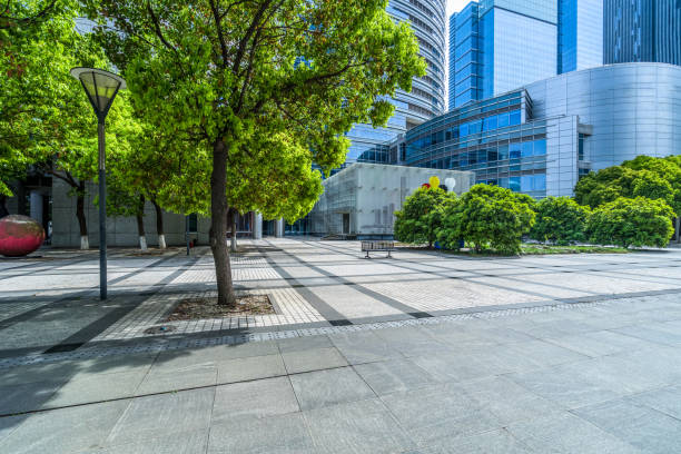 istock modern buildings and empty pavement in china 1477321198