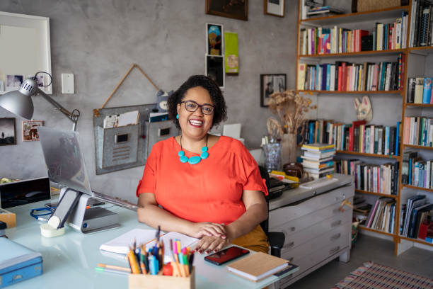 Portrait of mature black woman working in the office stock photo