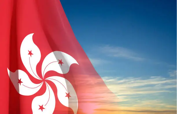 Vector illustration of Hong Kong flag against the sunset