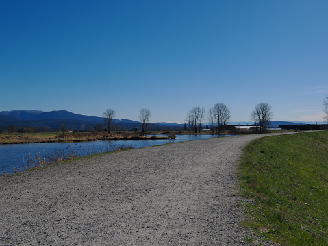 Landscape view on trail pavilion along the Alouette River in Pitt Meadows, BC