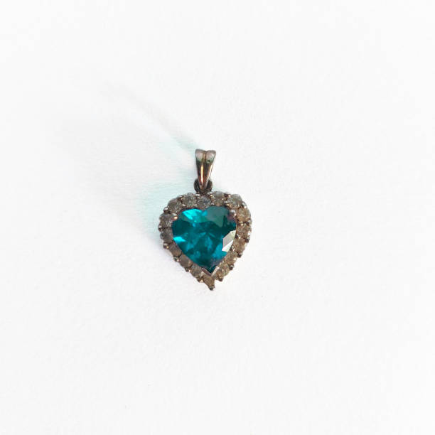 istock heart shaped pendant with blue tosca gemstone 1477359276