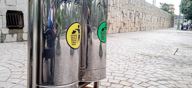 istock trash cans on the sidewalk of the highway. 1477362483