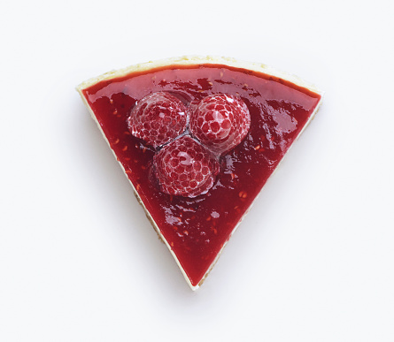 A slice of raspberry cake. On the white background