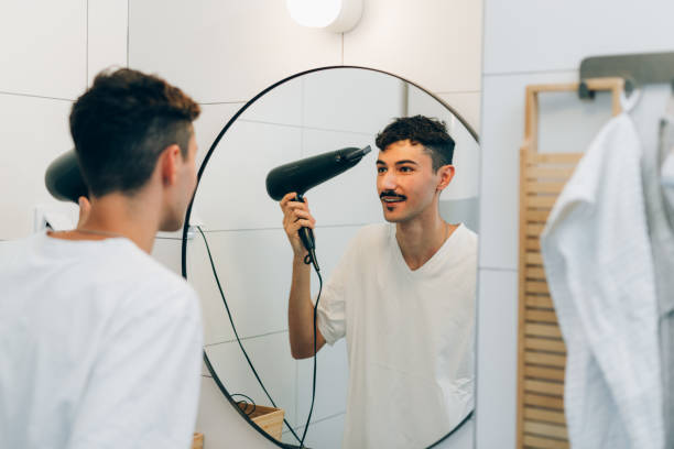 istock young adult man prepares for work 1477374850