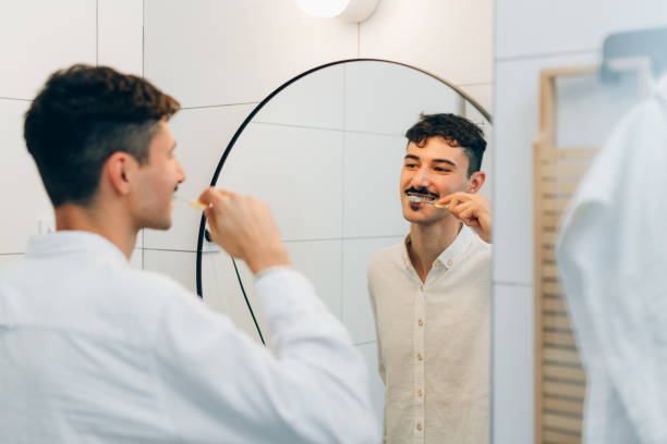 istock young adult man prepares for work 1477374857