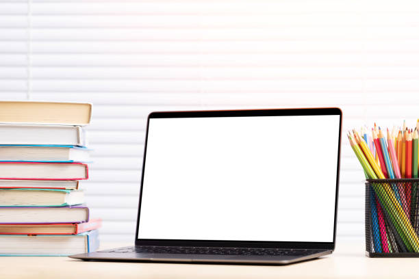 istock Laptop, books and pencils on desk 1477376639