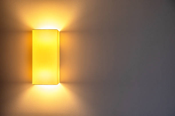 istock Cozy warm white lighting from a modern wall lamp 1477377819