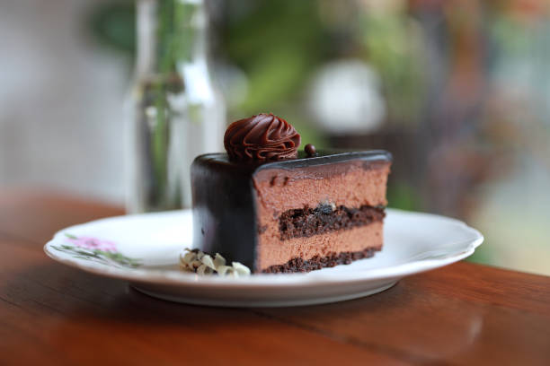 Sweet dessert, a plate of chocolate cake on  a plate close up