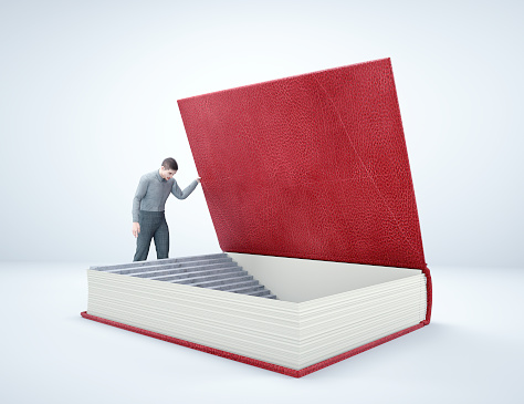 Man on stairs inside a book. Discovery and education concept. This is a 3d render illustration