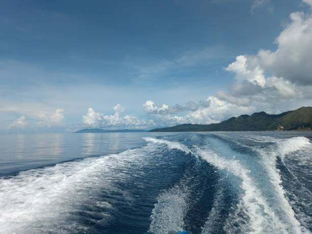 istock Beautiful blue sea and sky with clouds 1477388369