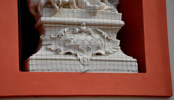 istock the nets protect monuments and scohs from perching and nesting pigeons. faeces will stain all ledges and windows with faeces. by stretching the knitted label we will protect the cultural heritage 1477393190