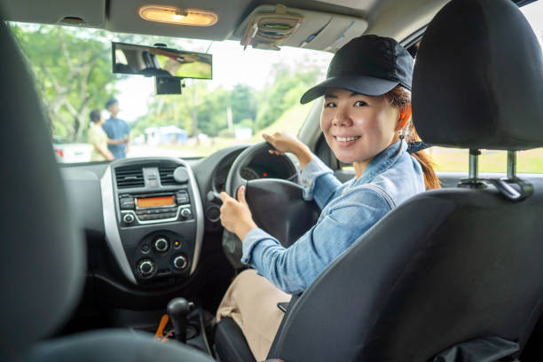 istock Confident female driver In Driving Seat 1477394173