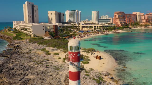 Aerial view of Cancun hotel zone skyline and Punta Cancun Lighthouse.