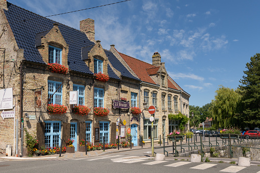 Bergues, France - July 5, 2022: Traditional houses in the village bergues in france, summer, holiday