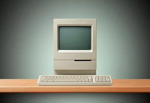 A classic 90s beige personal home computer office setup. 3d illustration