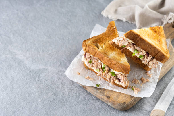istock Tuna sandwich with vegetables on gray stone background 1477409570