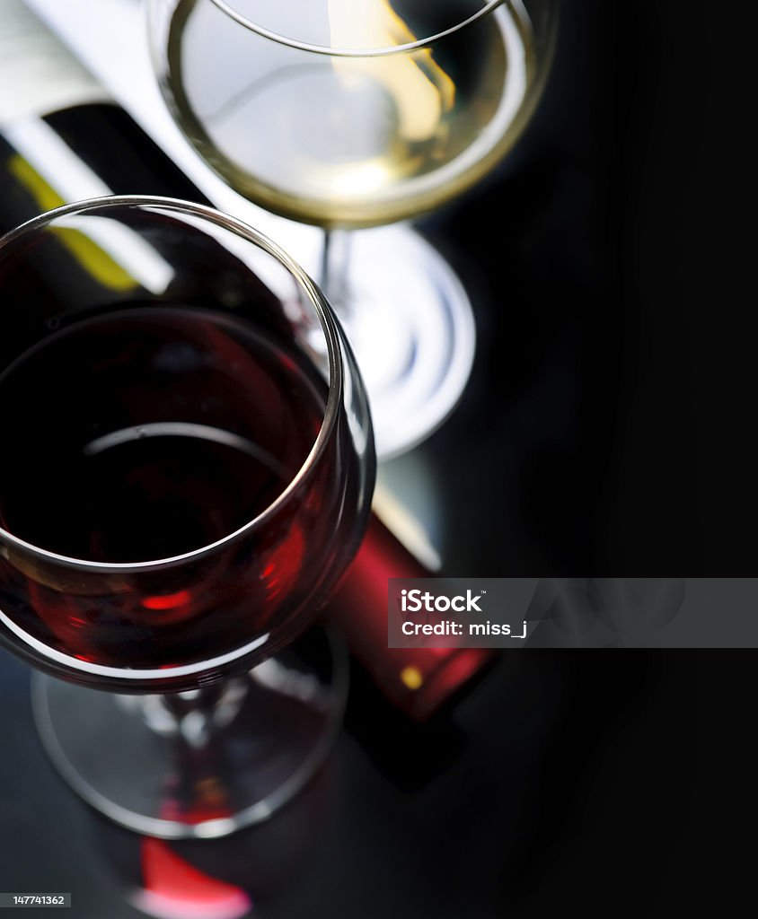 Wine Glass of red and white wine on black background Alcohol - Drink Stock Photo