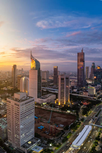 Aerial View of Jakarta City during the golden hour. Sunset in Jakarta, the capital city of indonesia. Jakarta is the largest economy driven in Indonesia. jakarta stock pictures, royalty-free photos & images