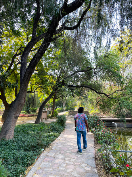 Stock photo showing the free to enter landscaped public park of Lodhi Gardens home to the mausoleums of Mohammed Shah and Sikander Lodhi.