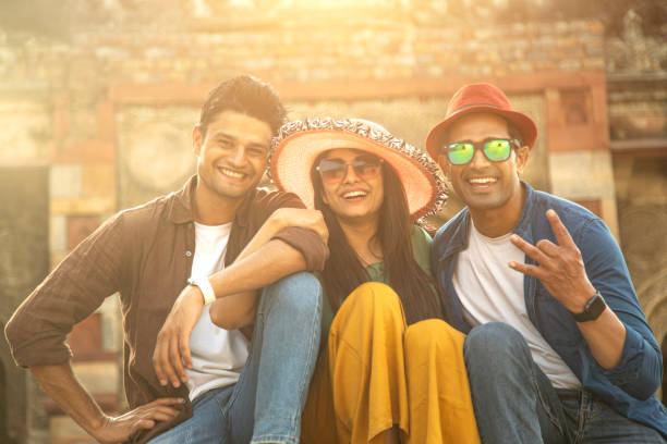 istock Group of friends having fun while posing together at historic site 1477424929