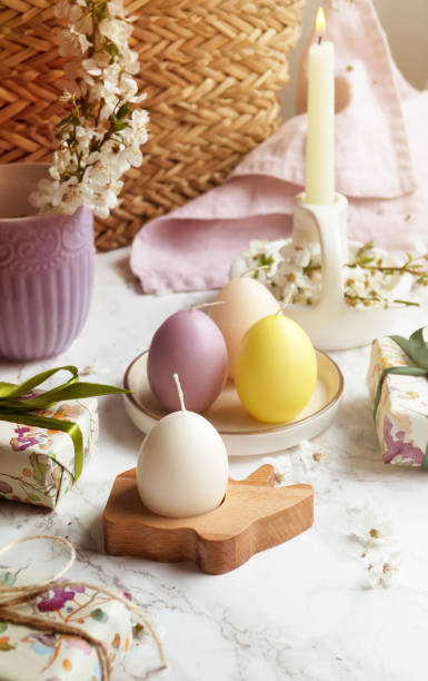 istock Easter bunny and eggs candle decoration 1477428416