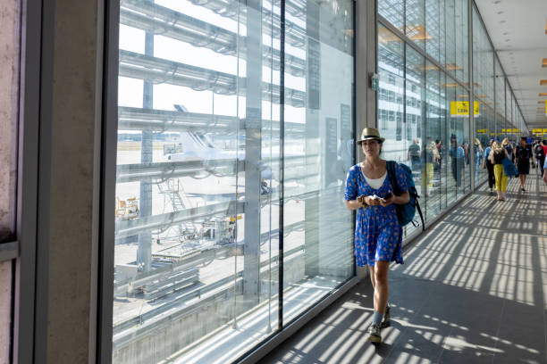 istock Walking Through Airport Terminal 1477428944
