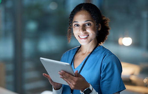 Nurse portrait, tablet and black woman in hospital working on telehealth, research or online consultation. Face, healthcare and female physician with technology for wellness app in clinic at night.