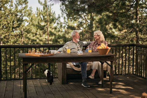 istock Happy senior couple talking on a terrace. 1477435176