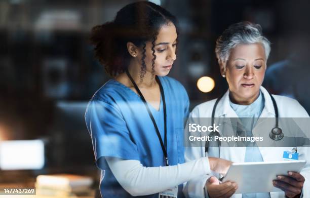 Women Doctors And Tablet For Night Medical Research Surgery Planning And Teamwork In Hospital Nurse Healthcare And Worker Collaboration On Technology In Late Shift For Wellness Thinking And Ideas Stock Photo - Download Image Now