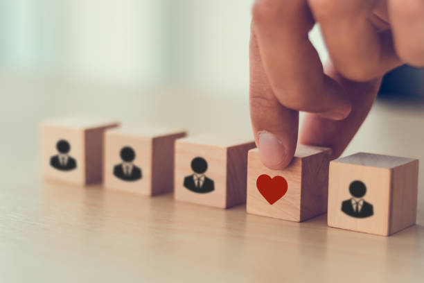 istock Increasing employee engagement and retention concept. Positive work environment to keep their employees happy and productive. Reduced staff turnover, improved employee morale,
better work,life balance 1477440522