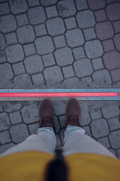 istock Integrated crosswalk stoplight for pedestrians in asphalt. 1477440973