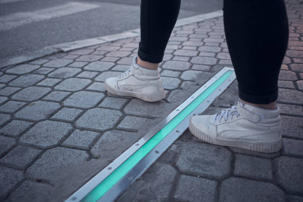 istock Integrated crosswalk stoplight for pedestrians in asphalt. 1477441514